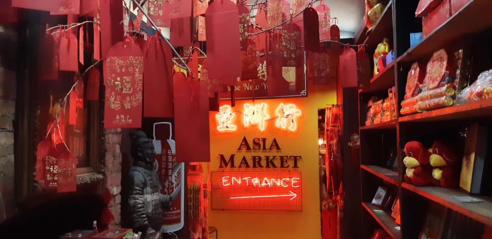 Asia Market entrance with neon signage