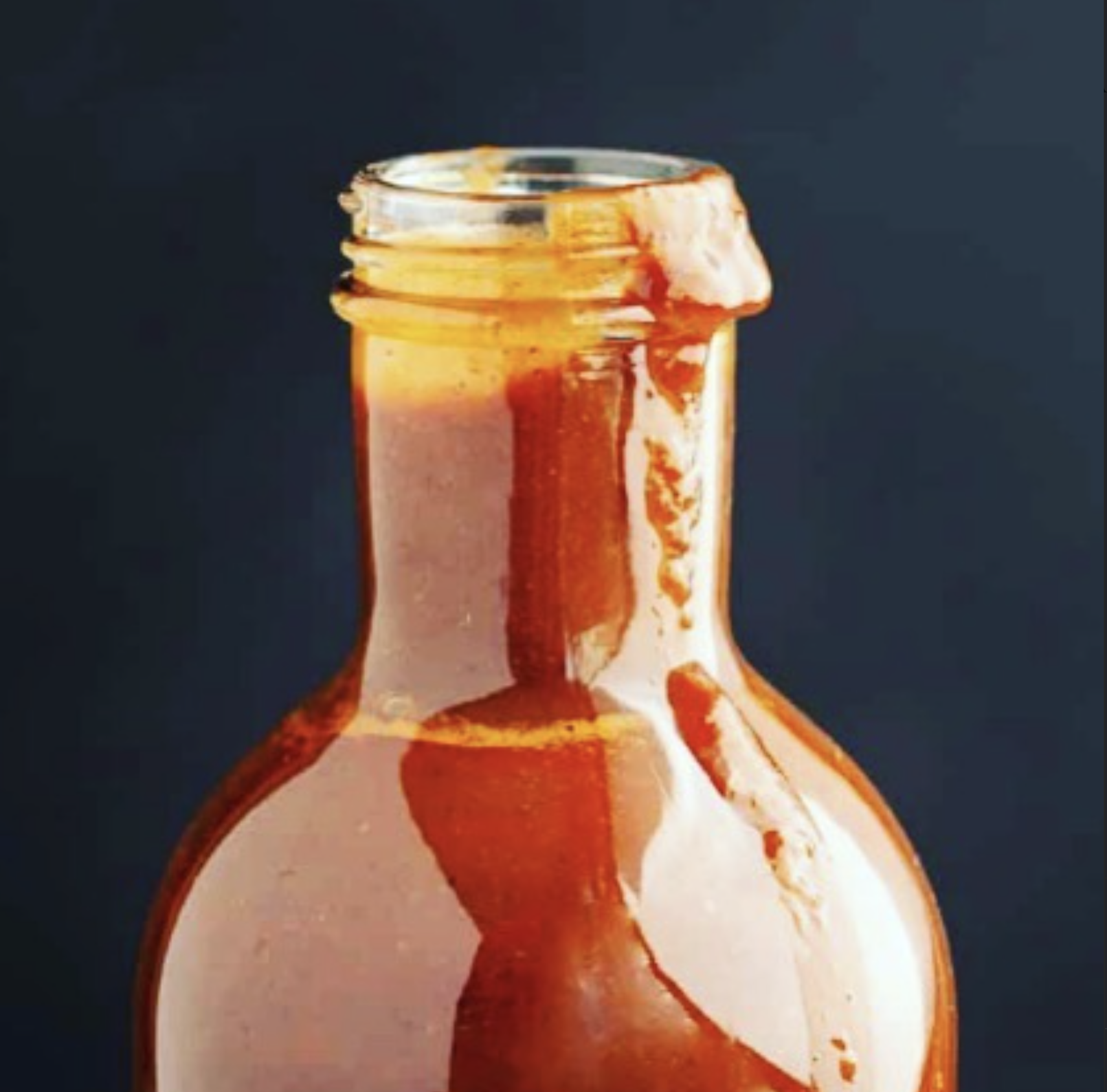 Close-up of rich BBQ sauce in a bottle